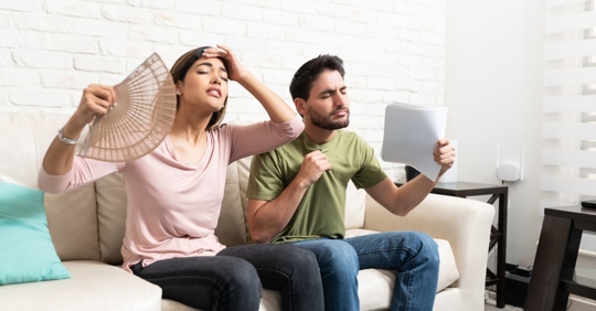 people fanning themselves