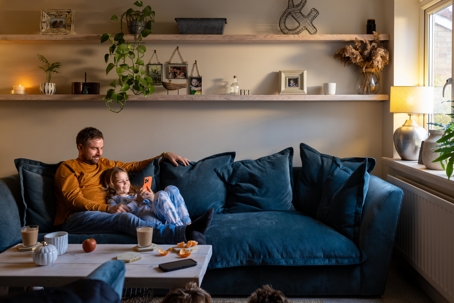 father and daughter cozy at home